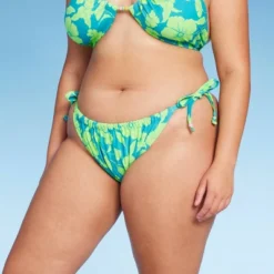 Women's Adjustable Coverage Bikini Bottom - Wild Fable™ Blue/Green Tropical Print -Wild Fable Elegant Shop GUEST 808a435c 0d3d 45cd 9338 bcdb9fb42a32