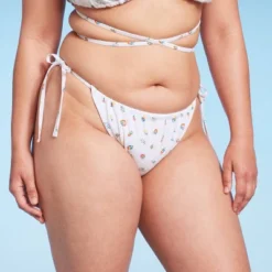 Women's Floral Print Side-Tie Ultra High Leg Adjustable Coverage Bikini Bottom - Wild Fable™ White 2 Women's Floral Print Side-Tie Ultra High Leg Adjustable Coverage Bikini Bottom - Wild Fable™ White -Wild Fable Elegant Shop GUEST a76abeab 66b2 4843 943b d7f414064e80