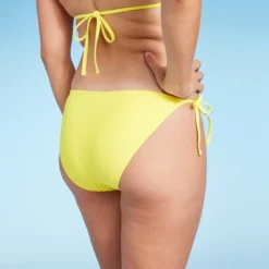 Women's Side-Tie Cheeky Bikini Bottom - Wild Fable™ Yellow -Wild Fable Elegant Shop GUEST d60575f0 7377 464a 8b1f bea4ae4f1fb7