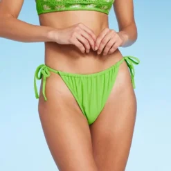 Women's Low-Rise Side-Tie Cheeky Bikini Bottom - Wild Fable™ 7 Women's Low-Rise Side-Tie Cheeky Bikini Bottom - Wild Fable™ -Wild Fable Elegant Shop GUEST fb45f3d8 0545 4021 95ce 6cc80b70ceec